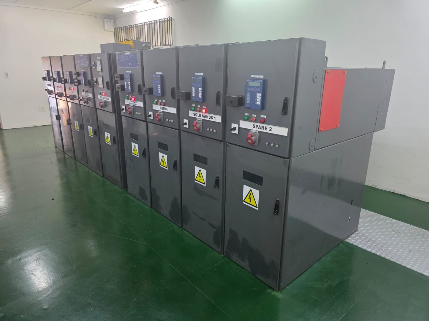 Angled view of the completed switchgear row