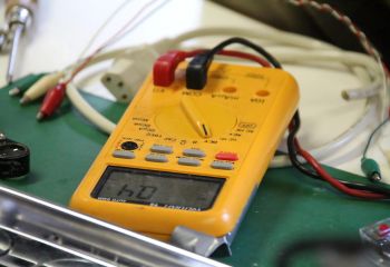 Technician inspecting electrical equipment